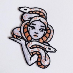 Embroidered badge snake lady