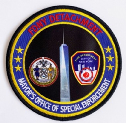 Printed badge with embroidered details